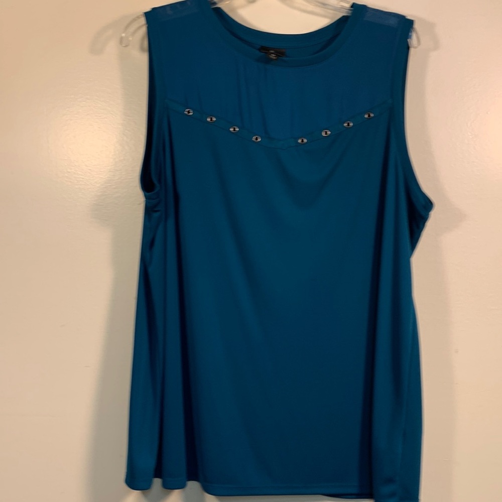 Teal sleeveless tshirt with sheer neckline and brass accents. 1X